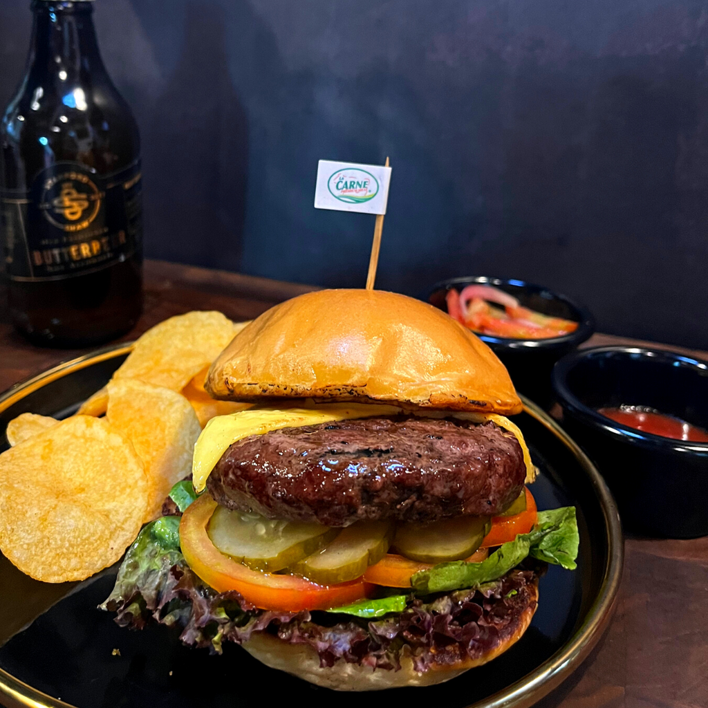 Savor the Juiciest Burgers and Smokey Brisket Sandwiches at La Carne Steak Bar - Limited Time Offer! 👀